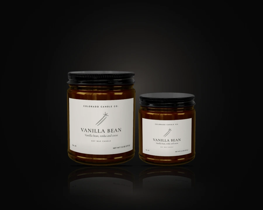 Vanilla Bean soy candle in both sizes, 9 oz and 4 oz amber glass jars with black lids